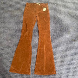 High waisted light brown bell bottoms.